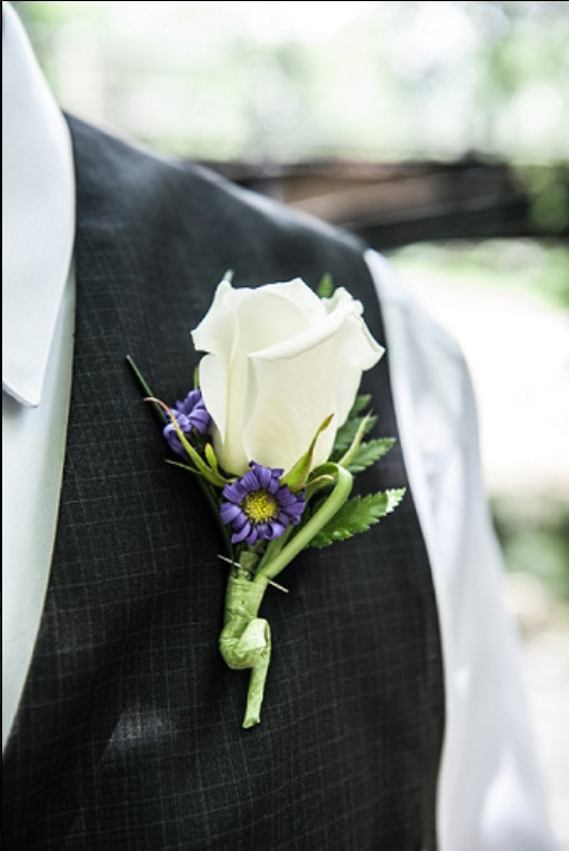 rose aster boutonniere 