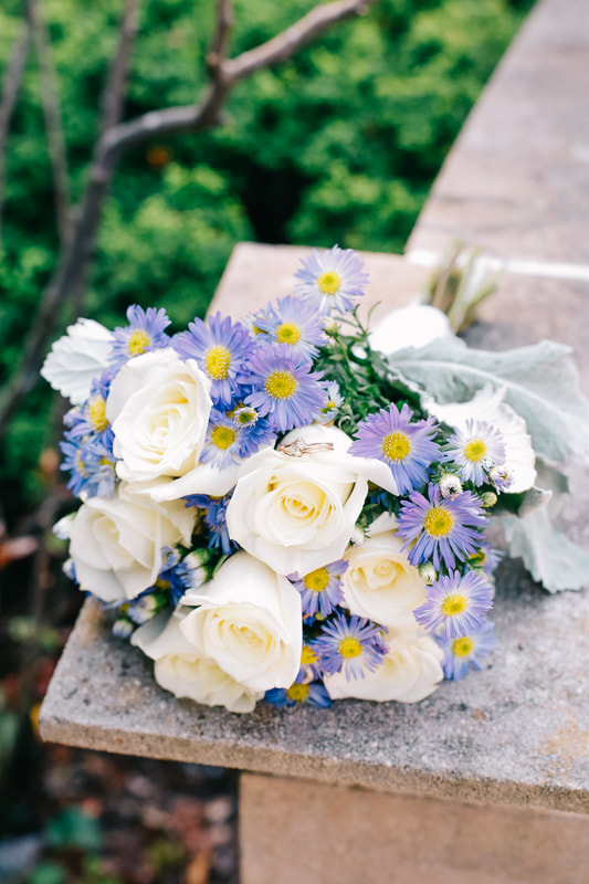 white rose aster bouquet